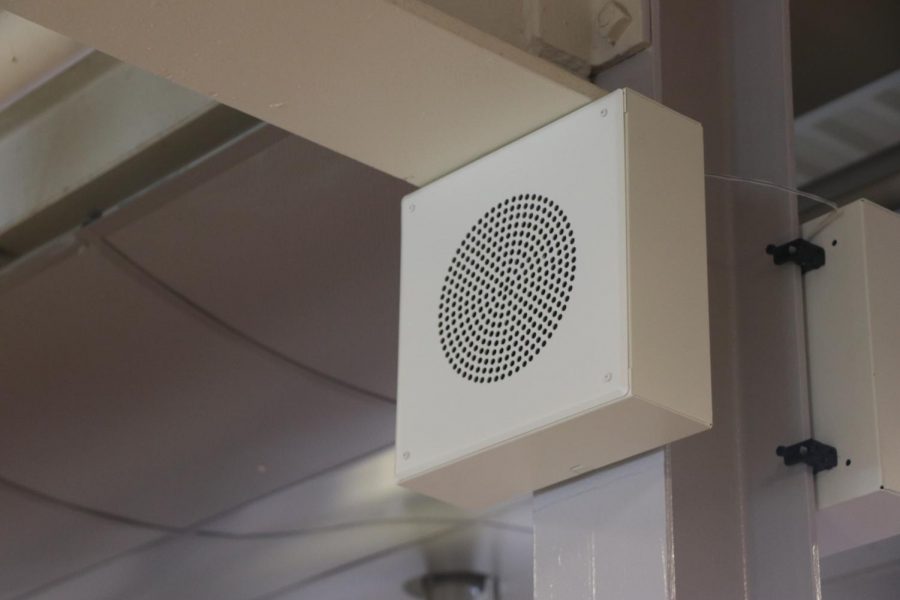 School paging system ceiling speaker installed in a Texas elementary school hallway connected to an IP paging controller for bell scheduling and emergency alerts
